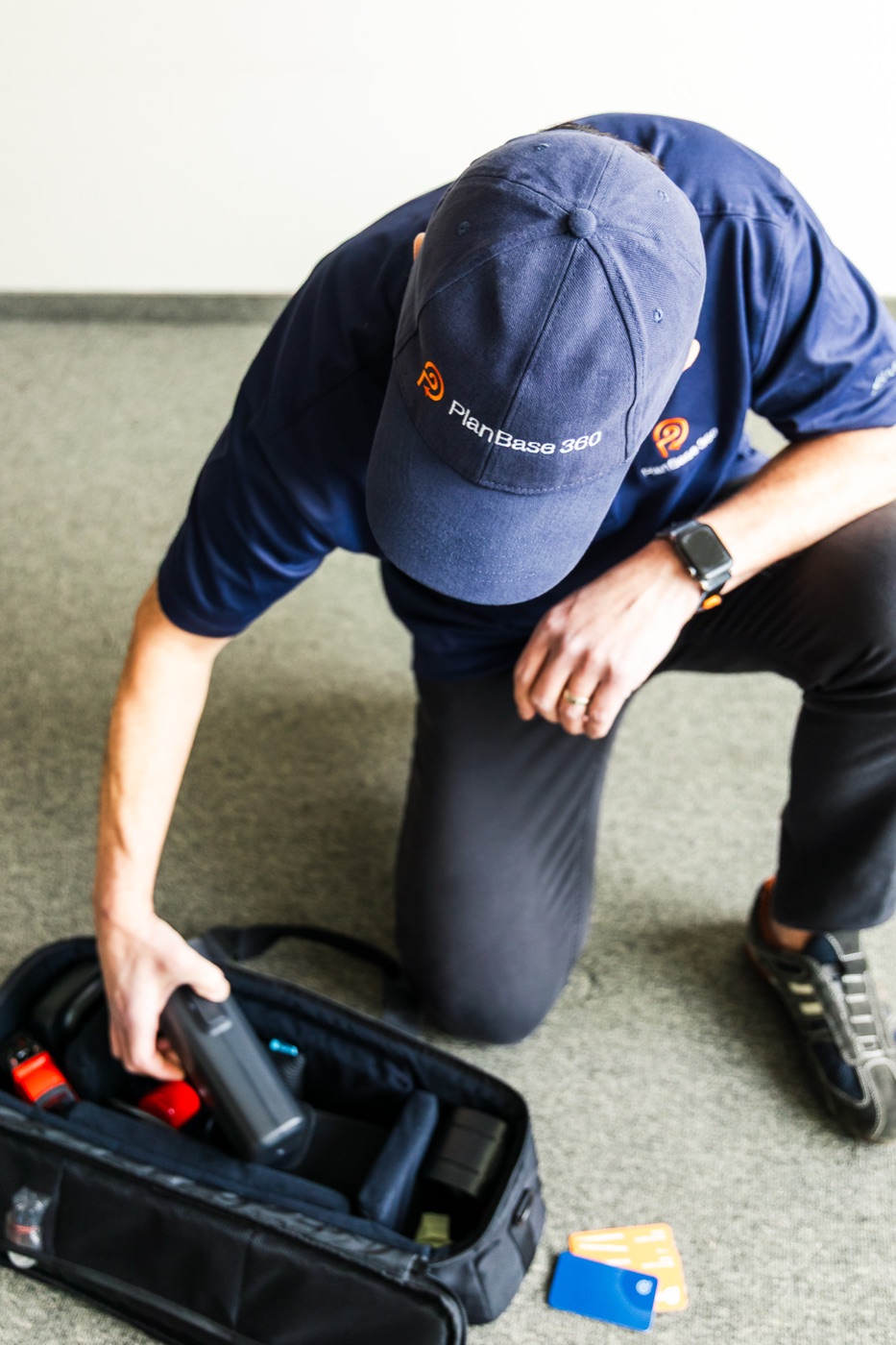 Operator unpacking LiDAR scanning equipment from case